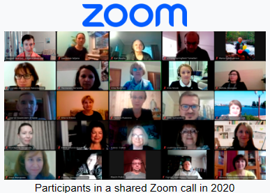 Picture of group people using Zoom for conference video call 
